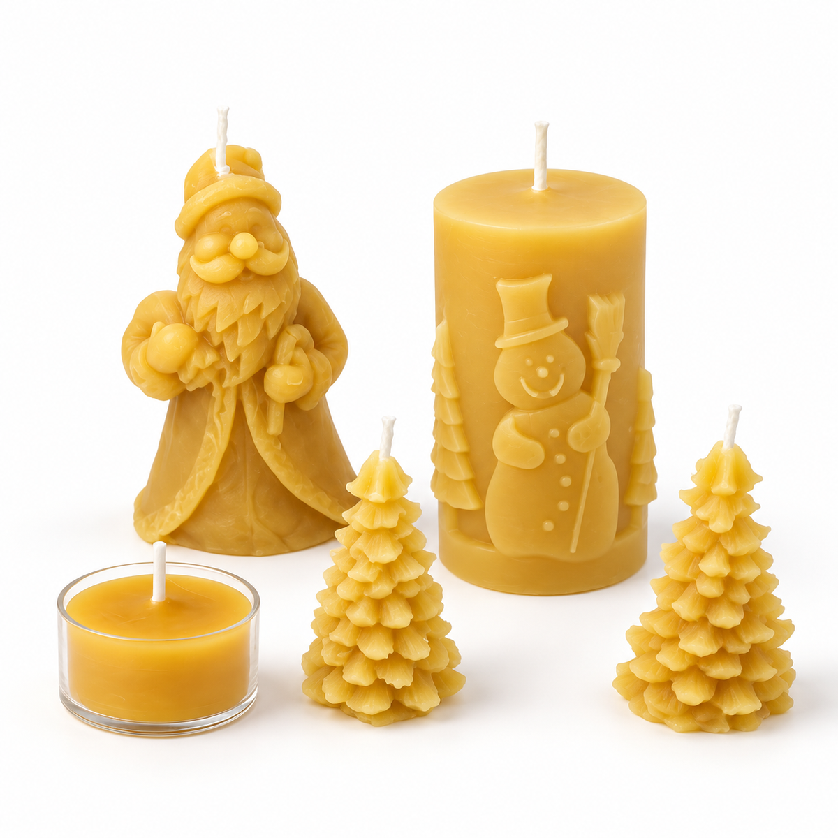 Christmas beeswax candle gift set with Santa, a snowman pillar, two Christmas trees, and a tealight on a white background.