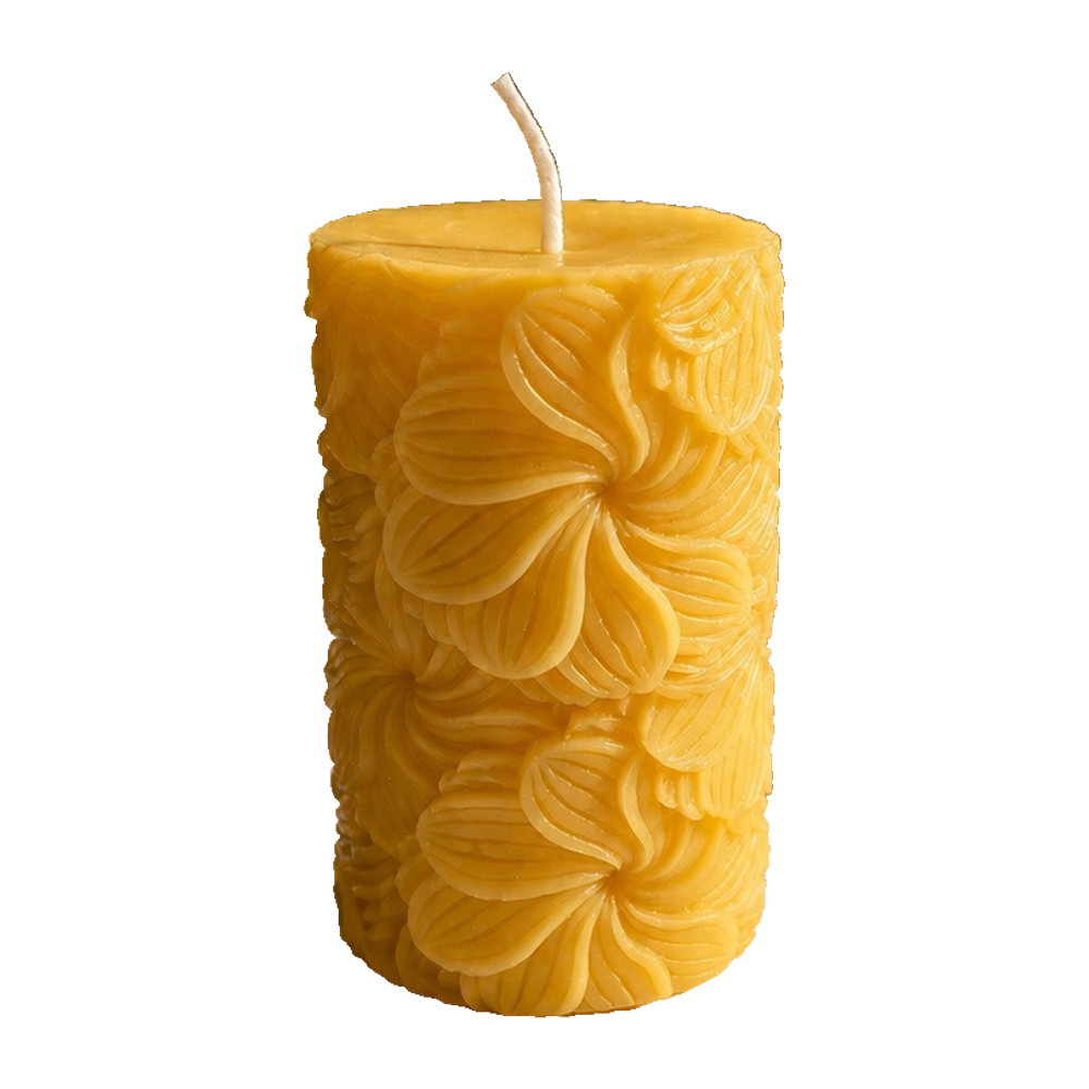 Pinwheel flower beeswax pillar candle on a white background.