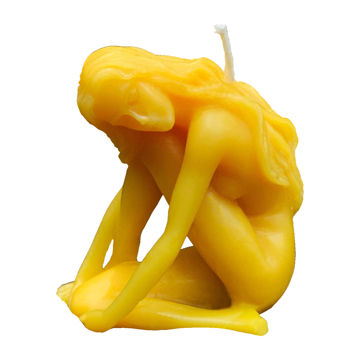 Girl posing beeswax figurine candle with original carved details and full wick on white background