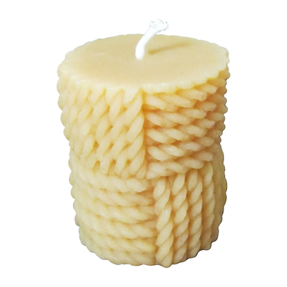 Original braided rope beeswax pillar candle with full wick on a white background