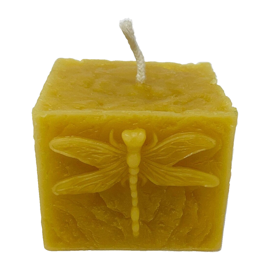 Square Dragonfly Beeswax Pillar Candle on a pure white background.