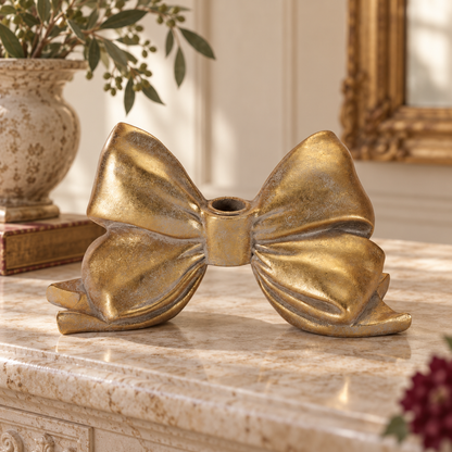 Bow Taper Candle Holder 5"H Resin in a styled home setting