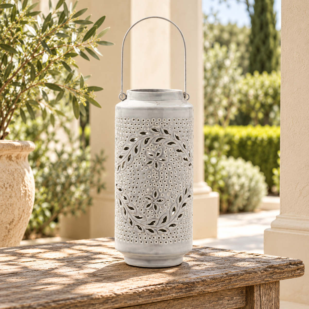 Punched Metal Candle Lantern 15.5"H in a styled home setting