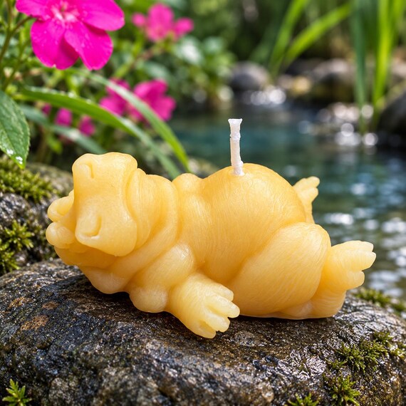 Lazy Hippo beeswax candle reclining on its side, handmade animal candle